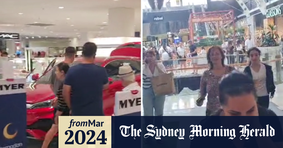 Video Electric car on display reverses into Myer shopfront